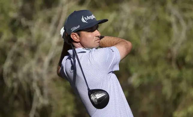 J.T. Poston hits off the tee on the 13th hole during the final round of the Shriners Children's Open golf tournament, Sunday, Oct. 20, 2024, in Las Vegas. (AP Photo/Ian Maule)