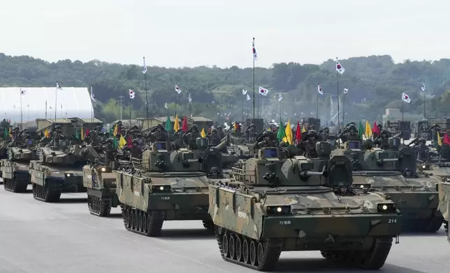 South Korean mechanized unit personnel parade with their armored vehicles during the media day for the 76th anniversary of Armed Forces Day at Seoul air base in Seongnam, South Korea, Wednesday, Sept. 25, 2024. (AP Photo/Ahn Young-joon)