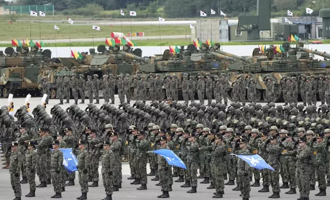 South Korean soldiers salute during the media day for the 76th anniversary of Armed Forces Day at Seoul air base in Seongnam, South Korea, Wednesday, Sept. 25, 2024. (AP Photo/Ahn Young-joon)