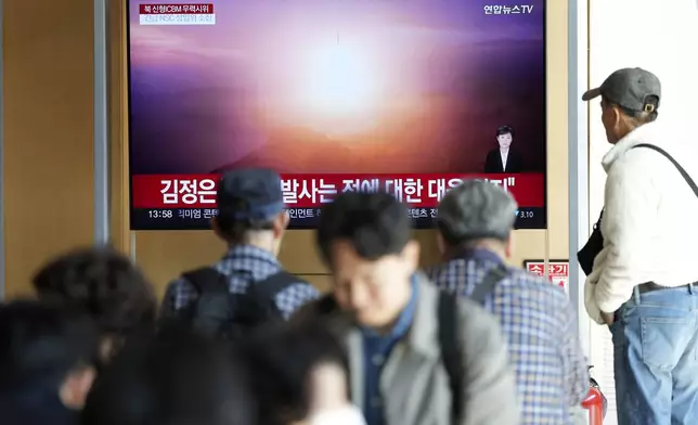 A TV screen shows an image of North Korea's an intercontinental ballistic missile launch during a news program at the Seoul Railway Station in Seoul, South Korea, Thursday, Oct. 31, 2024. (AP Photo/Lee Jin-man)