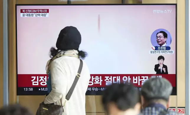 A TV screen reports North Korea's an intercontinental ballistic missile launch during a news program at the Seoul Railway Station in Seoul, South Korea, Thursday, Oct. 31, 2024. (AP Photo/Lee Jin-man)