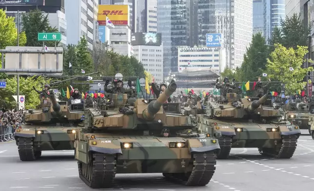 South Korean army's K2 tanks take part in a parade during the 76th Armed Forces Day ceremony in Seoul, South Korea, Tuesday, Oct. 1, 2024. (AP Photo/Ahn Young-joon)
