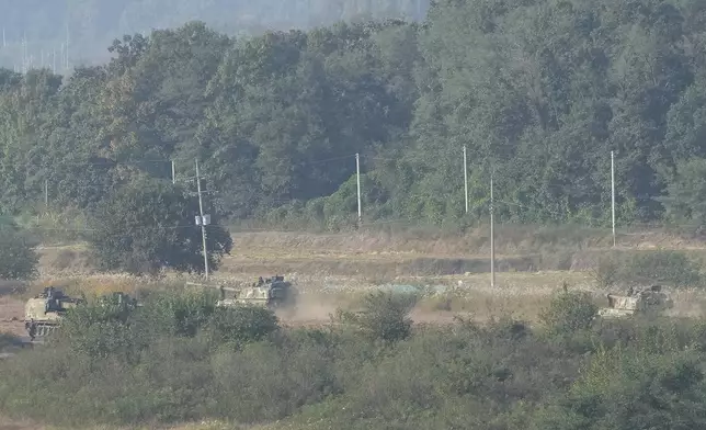 South Korean army K-9 self-propelled howitzers move in Paju, South Korea, near the border with North Korea, Thursday, Oct. 17, 2024. (AP Photo/Ahn Young-joon)