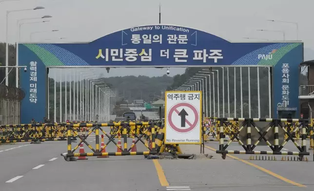 Barricades are placed near the Unification Bridge, which leads to the Panmunjom in the Demilitarized Zone in Paju, South Korea, Monday, Oct. 14, 2024. (AP Photo/Ahn Young-joon)