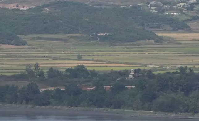 A North Korean military guard post is seen from the Unification Observation Post in Paju, South Korea, near the border with North Korea, Thursday, Oct. 10, 2024. (AP Photo/Ahn Young-joon)