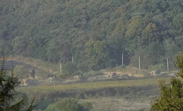 South Korean army K-9 self-propelled howitzers move in Paju, near the border with North Korea, South Korea, Thursday, Oct. 17, 2024. (AP Photo/Ahn Young-joon)