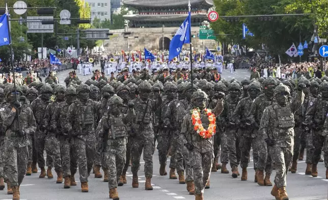 South Korean army soldiers take part in a parade during the 76th Armed Forces Day ceremony in Seoul, South Korea, Tuesday, Oct. 1, 2024. (AP Photo/Ahn Young-joon)