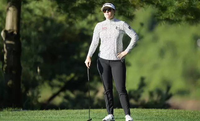 Hannah Green, of Australia prepares for a putt on the 12th green during the second round of the LPGA Ladies Championship golf tournament at the Seowon Valley Country Club in Paju, South Korea, Saturday, Oct. 19, 2024. (AP Photo/Lee Jin-man)