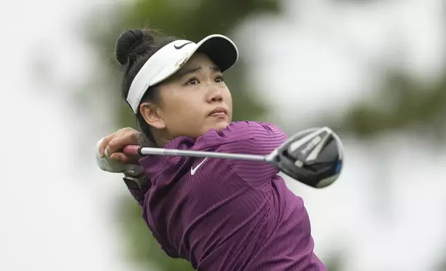 Lucy Li, of the United States watches her tee shot on the sixth hole during the second round of the LPGA Ladies Championship golf tournament at the Seowon Valley Country Club in Paju, South Korea, Friday, Oct. 18, 2024. (AP Photo/Lee Jin-man)