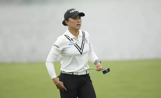 Amy Yang of South Korea walks on the fifth green during the second round of the LPGA Ladies Championship golf tournament at the Seowon Valley Country Club in Paju, South Korea, Friday, Oct. 18, 2024. (AP Photo/Lee Jin-man)