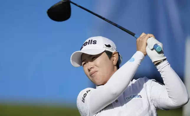 Eun-hee Ji, of South Korea watches her tee shot on the 15th hole during the second round of the LPGA Ladies Championship golf tournament at the Seowon Valley Country Club in Paju, South Korea, Saturday, Oct. 19, 2024. (AP Photo/Lee Jin-man)