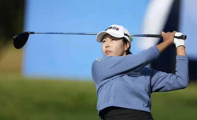 Yu Jin Sung of South Korea watches her tee shot on the 15th hole during the second round of the LPGA Ladies Championship golf tournament at the Seowon Valley Country Club in Paju, South Korea, Saturday, Oct. 19, 2024. (AP Photo/Lee Jin-man)