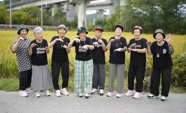 Members of Suni and the Seven Princesses pose for a photo in Chilgok, South Korea, Thursday, Oct. 3, 2024. (AP Photo/Lee Jin-man)