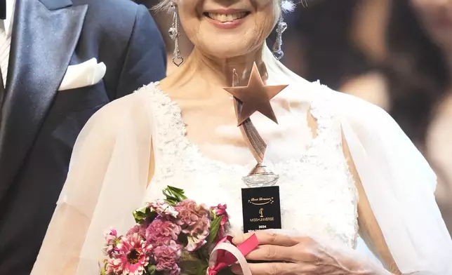 South Korean Choi Soon-hwa, 81-year-old, poses after winning the best dress award for the 2024 Miss Universe Korea in Seoul, South Korea, Monday, Sept. 30, 2024. (AP Photo/Lee Jin-man)