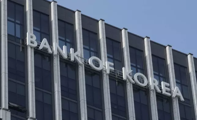 A sign for Bank of Korea is seen at its headquarters building in Seoul, South Korea, Friday, Oct. 11, 2024. (AP Photo/Ahn Young-joon)
