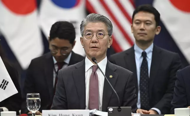 South Korea's First Vice Foreign Minister Kim Hong-kyun, center, attends a trilateral meeting with United States Deputy Secretary of State Kurt Campbell, unseen, and Japan's Vice Foreign Minister Masataka Okano, unseen, at the Foreign Ministry in Seoul Wednesday, Oct. 16, 2024. (Jung Yeon-je/Pool Photo via AP)