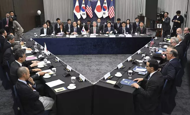 South Korea's First Vice Foreign Minister Kim Hong-kyun, center, attends a trilateral meeting with United States Deputy Secretary of State Kurt Campbell and Japan's Vice Foreign Minister Masataka Okano at the Foreign Ministry in Seoul Wednesday, Oct. 16, 2024. (Jung Yeon-je/Pool Photo via AP)