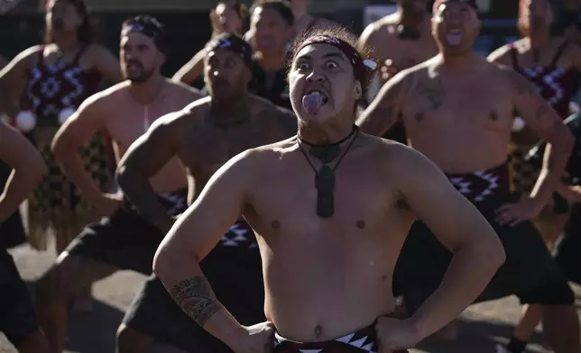 Maoris perform a traditional Haka dance after Emirates Team New Zealand c won the Louis Vuitton 37th America's Cup in Barcelona, Spain, on Saturday, Oct. 19, 2024. (AP Photo/Emilio Morenatti)