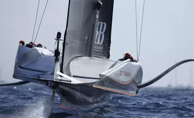 Ineos Britannia sails before the start of the Louis Vuitton 37th America's Cup Day 4 race 5 in Barcelona, Spain, Wednesday, Oct. 16, 2024. (AP Photo/Bernat Armangue)