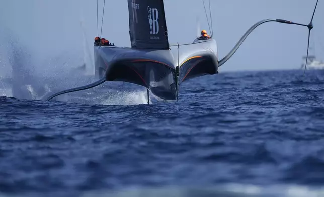 Ineos Britannia sails before the start of the Louis Vuitton 37th America's Cup Day 4 race 5 in Barcelona, Spain, Wednesday, Oct. 16, 2024. (AP Photo/Bernat Armangue)