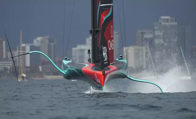 Emirates Team New Zealand races during the Louis Vuitton 37th America's Cup race in Barcelona, Spain, Saturday, Oct. 12, 2024. (AP Photo/Bernat Armangue)