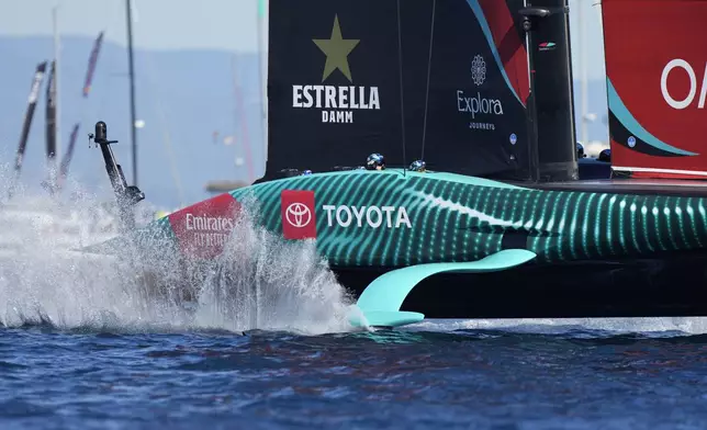 Emirates Team New Zealand races during the Louis Vuitton 37th America's Cup Day 6 race 9 in Barcelona, Spain, Saturday, Oct.19, 2024. (AP Photo/Bernat Armangue)