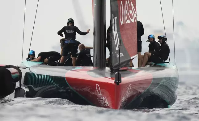 Emirates Team New Zealand prepares for the Louis Vuitton 37th America's Cup Day 3 race 4 in Barcelona, Spain, on Monday, Oct. 14, 2024. (AP Photo/Bernat Armangue)