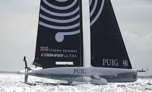 Athena Pathway team warms up for Puig Womne's America's Cup race in Barcelona, Spain, Saturday, Oct. 12, 2024. (AP Photo/Bernat Armangue)