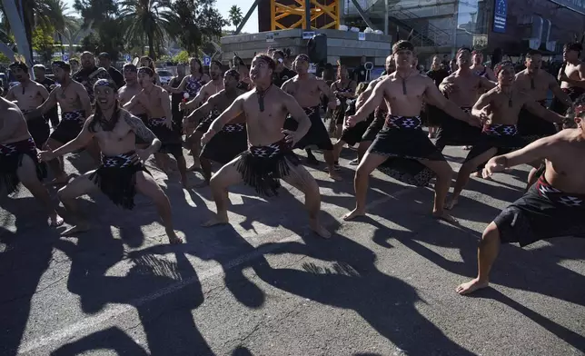 Maoris perform a traditional Haka dance after Emirates Team New Zealand c won the Louis Vuitton 37th America's Cup in Barcelona, Spain, on Saturday, Oct. 19, 2024. (AP Photo/Emilio Morenatti)