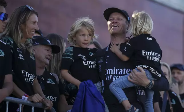 Nathan Outteridge, an Emirates Team New Zealand crew member, reacts as their team wins the Louis Vuitton 37th America's Cup in Barcelona, Spain, Saturday, Oct. 19, 2024. (AP Photo/Emilio Morenatti)