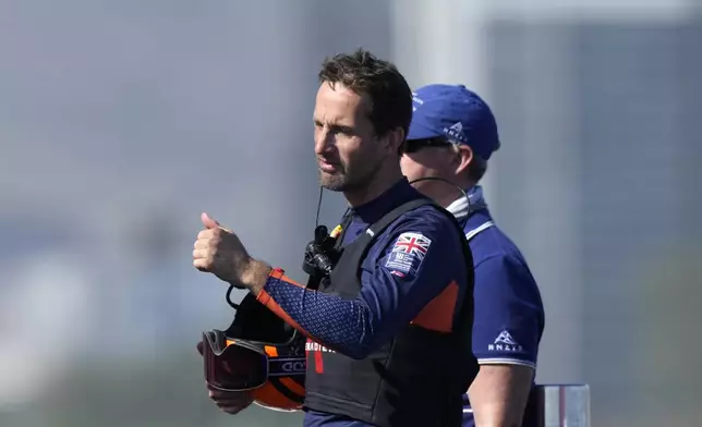 Ineos Britannia skipper Ben Ainslie reacts after winning the race 5 of the Louis Vuitton 37th America's Cup Day 4, in Barcelona, Spain, Wednesday, Oct. 16, 2024. (AP Photo/Bernat Armangue)