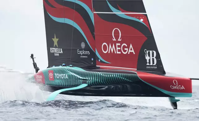 Emirates Team New Zealand races during the Louis Vuitton 37th America's Cup race in Barcelona, Spain, Saturday, Oct. 12, 2024. (AP Photo/Bernat Armangue)