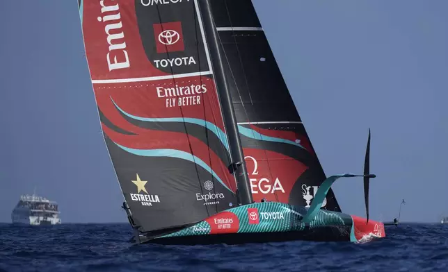 Emirates Team New Zealand races during the Louis Vuitton 37th America's Cup Day 4 race 5 in Barcelona, Spain, Wednesday, Oct. 16, 2024. (AP Photo/Bernat Armangue)