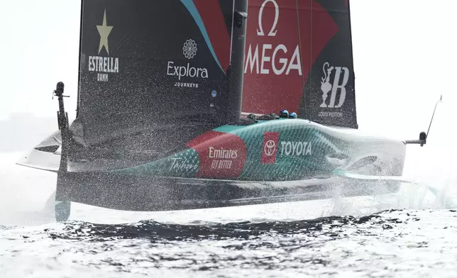 Emirates Team New Zealand crew sails before the Louis Vuitton 37th America's Cup race in Barcelona, Spain, Saturday, Oct. 12, 2024. (AP Photo/Bernat Armangue)