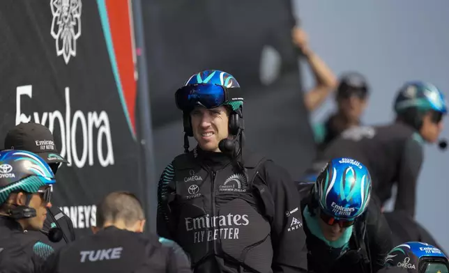 Emirates Team New Zealand skipper Peter Burling stands before the Louis Vuitton 37th America's Cup Day 2 race in Barcelona, Spain, on Sunday, Oct. 13, 2024. (AP Photo/Bernat Armangue