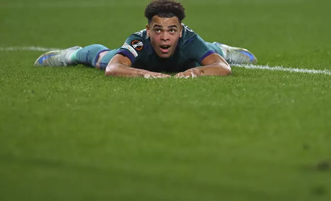 Anderlecht's Mario Stroeykens reacts as he lies on the ground during the Europa League opening phase soccer match between Real Sociedad and Anderlecht at the Reale Arena in San Sebastian, Spain, Thursday, Oct. 3, 2024. (AP Photo/Miguel Oses)