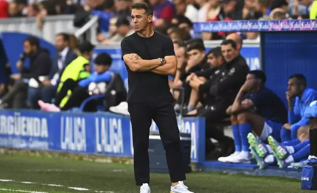 Alaves' head coach Luis Garcia Plaza gestures during a Spanish La Liga soccer match against Barcelona at the Mendizorroza stadium in Vitoria-Gasteiz, Spain, Sunday, Oct. 6, 2024. (AP Photo/Miguel Oses)