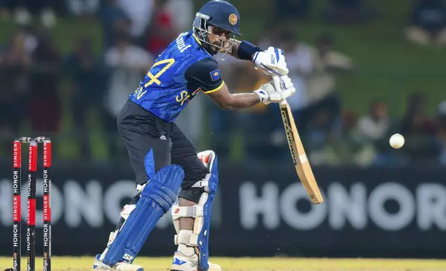 Sri Lanka's Nishan Madushka plays a shot during the first ODI cricket match between Sri Lanka and West Indies in Pallekele, Sri Lanka, Sunday, Oct. 20, 2024. (AP Photo/Viraj Kothalawala)