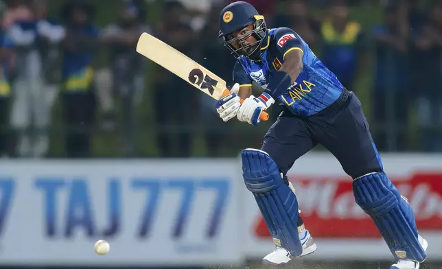 Sri Lanka's Janith Liyanage plays a shot during the first ODI cricket match between Sri Lanka and West Indies in Pallekele, Sri Lanka, Sunday, Oct. 20, 2024. (AP Photo/Viraj Kothalawala)