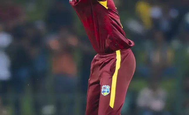 West Indies' Gudakesh Motie successfully appeals to dismiss Sri Lanka's Captain Charith Asalanka during the first ODI cricket match between Sri Lanka and West Indies in Pallekele, Sri Lanka, Sunday, Oct. 20, 2024. (AP Photo/Viraj Kothalawala)