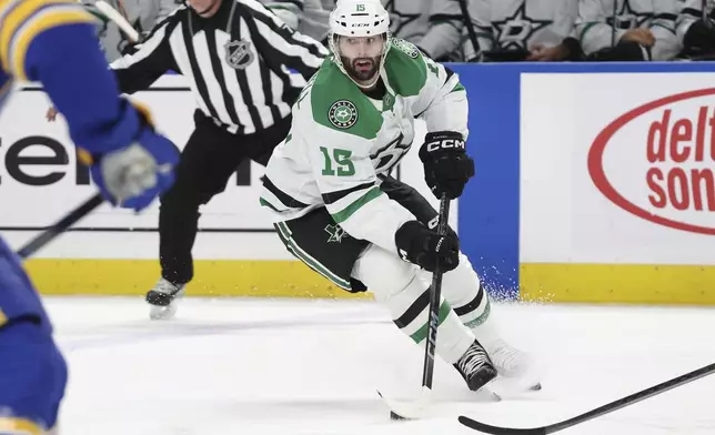 Dallas Stars center Colin Blackwell (15) carries the puck into the zone during the second period of an NHL hockey game against the Buffalo Sabres, Tuesday, Oct. 22, 2024, in Buffalo, N.Y. (AP Photo/Jeffrey T. Barnes)