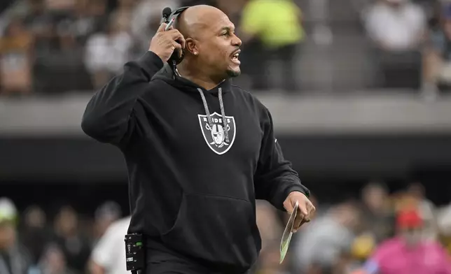 Las Vegas Raiders head coach Antonio Pierce reacts during the first half of an NFL football game against the Pittsburgh Steelers in Las Vegas, Sunday, Oct. 13, 2024. (AP Photo/David Becker)