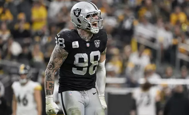 Las Vegas Raiders defensive end Maxx Crosby (98) reacts during the second half of an NFL football game against the Pittsburgh Steelers in Las Vegas, Sunday, Oct. 13, 2024. (AP Photo/David Becker)