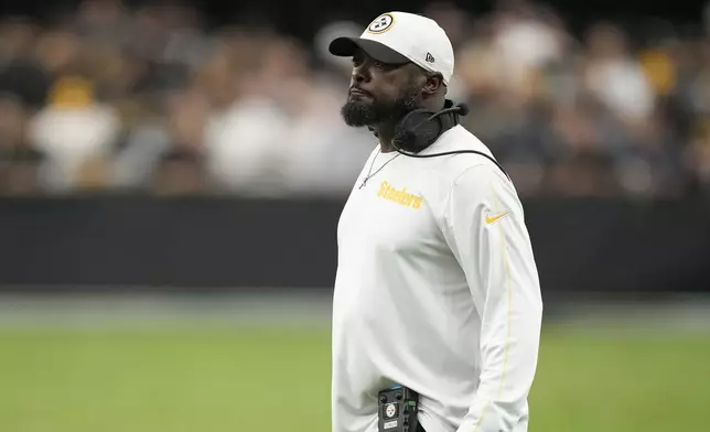 Pittsburgh Steelers head coach Mike Tomlin watches from the sideline during the first half of an NFL football game against the Las Vegas Raiders in Las Vegas, Sunday, Oct. 13, 2024. (AP Photo/John Locher)