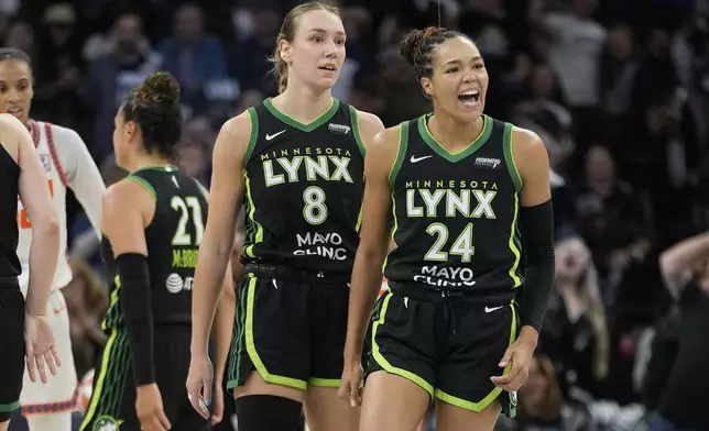 Minnesota Lynx forward Napheesa Collier (24) reacts after a Connecticut Sun timeout called during the first half of Game 5 of a WNBA basketball semifinals, Tuesday, Oct. 8, 2024, in Minneapolis. (AP Photo/Abbie Parr)