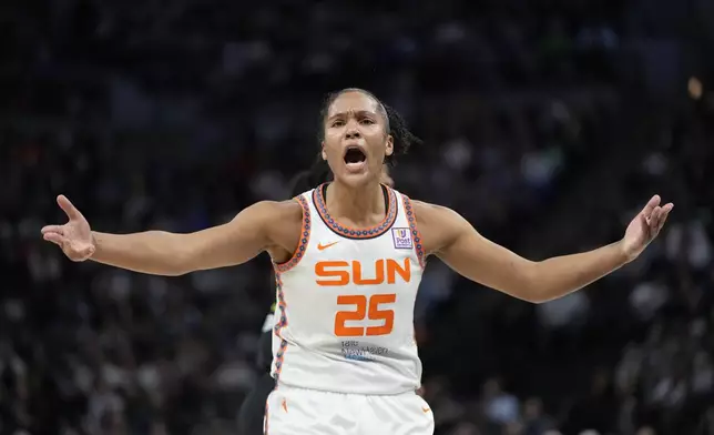 Connecticut Sun forward Alyssa Thomas (25) reacts toward a referee during the first half of Game 5 of a WNBA basketball semifinals game against the Minnesota Lynx, Tuesday, Oct. 8, 2024, in Minneapolis. (AP Photo/Abbie Parr)