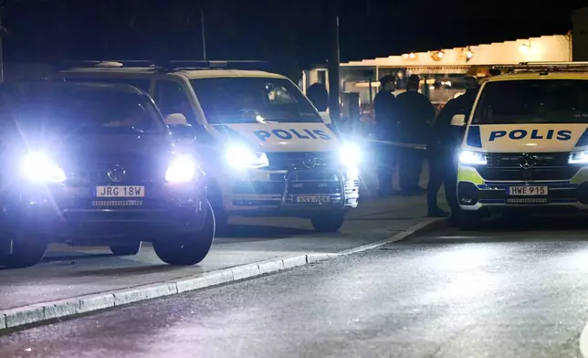 Police guard outside the Israeli embassy in Stockholm, Sweden, Tuesday, Oct. 1, 2024, after a suspected shooting near the embassy. (Anders Wiklund/TT News Agency via AP)