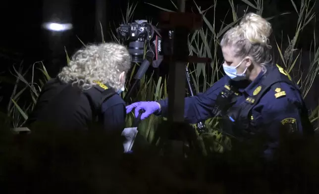 Police work outside the Israeli embassy in Stockholm, Sweden, Tuesday, Oct. 1, 2024, after a suspected shooting near the embassy. (Anders Wiklund/TT News Agency via AP)