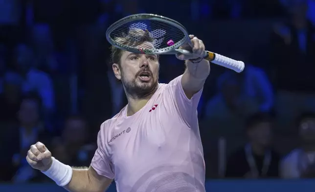 Switzerland's Stan Wawrinka celebrates defeating France's Adrian Mannarino in a first round match at the Swiss Indoors tennis tournament in Basel, Switzerland, Wednesday, Oct. 23, 2024. (Georgios Kefalas/Keystone via AP)