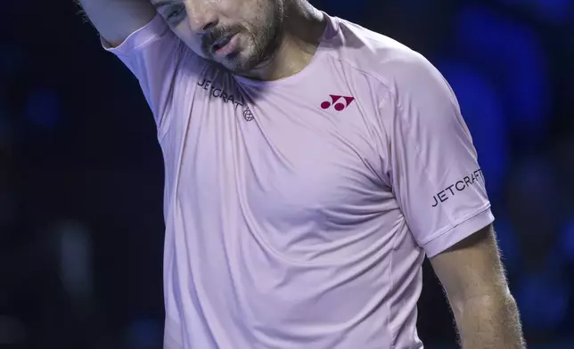 Switzerland's Stan Wawrinka during his first round match against France's Adrian Mannarino during a first round match at the Swiss Indoors tennis tournament in Basel, Switzerland, Wednesday, Oct. 23, 2024. (Georgios Kefalas/Keystone via AP)